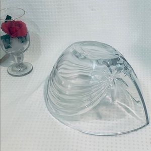 This is a beautiful glass fruit bowl.